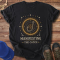 Manifesting The Catch T-Shirt